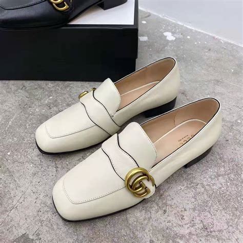 white gucci loafers women.